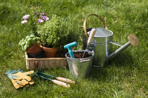 Insurance certificate and paperwork on a desk for garden maintenance company